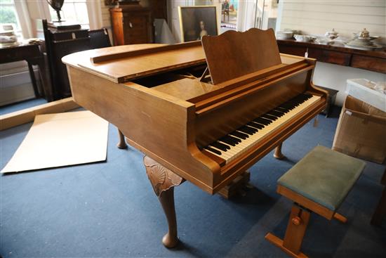 A Bluthner walnut cased boudoir grand piano, W.4ft 10in.